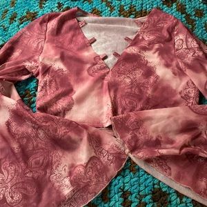 Pink flared out arms